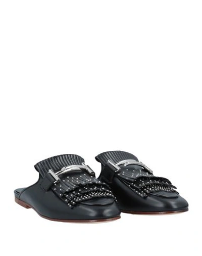 Tod's Studded Fringed Mules In Black