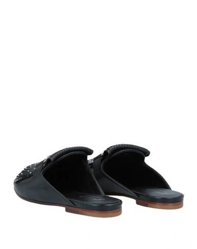Tod's Studded Fringed Mules In Black