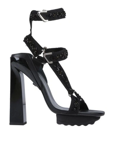 Shop Versace Sandals In Black