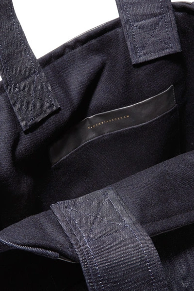 Shop Victoria Beckham Sunday Leather-trimmed Denim Tote In Dark Denim