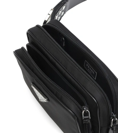 Shop Prada Leather-trimmed Belt Bag In Black