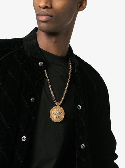 Shop Versace Gold Tone Medusa Medallion Necklace In Metallic