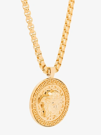 Shop Versace Gold Tone Medusa Medallion Necklace In Metallic