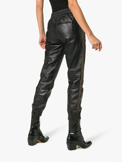 Shop Escentric Molecules Lot Lthr Slim Leg Leather Trackpants With Suede Stripes In Black