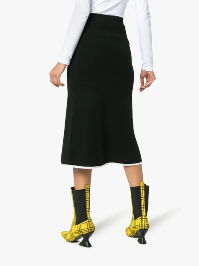 Shop Joostricot High-waisted Knitted Flared Midi Skirt In Black