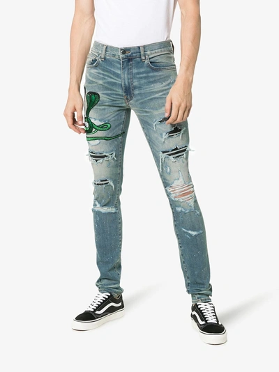 Shop Amiri Snake Patch Embroidered Skinny Jeans In Blue