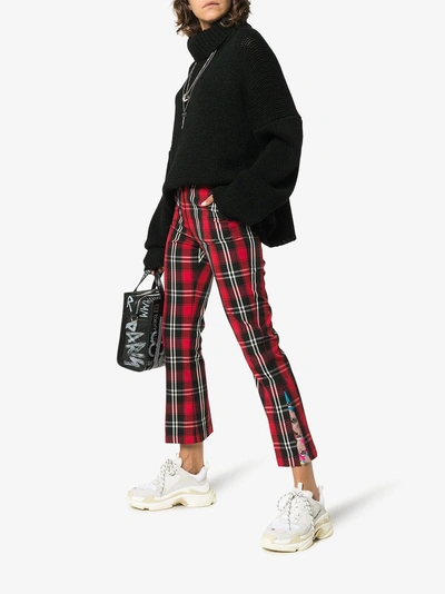 Shop Msgm Check Kick Flare Trousers In Red
