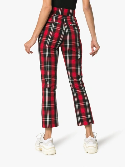 Shop Msgm Check Kick Flare Trousers In Red
