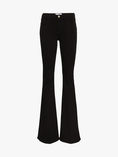 Shop Frame Le High Flared Jeans In Black