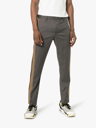 Shop Prada Checked Side Stripe Trousers In Grey
