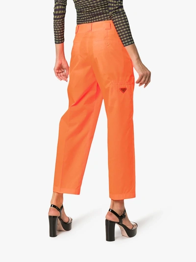 Shop Prada Fluorescent Cropped Trousers In Yellow/orange