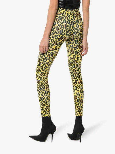 Shop Charm's Leopard Print Skinny Leggings In Yellow/orange