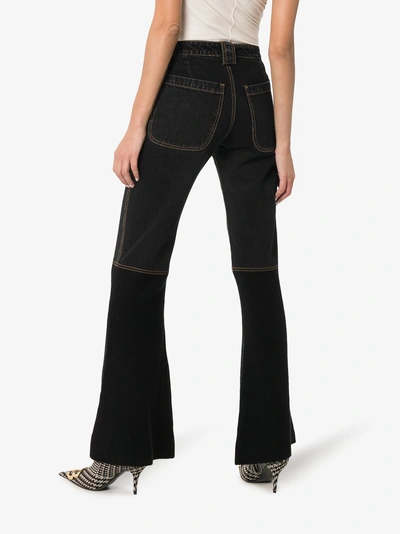 Shop Telfar Ribbed Flared Jeans In Black