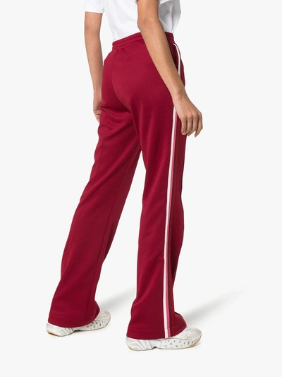 Shop Moncler Side Stripe Cotton-blend Track Pants In Red