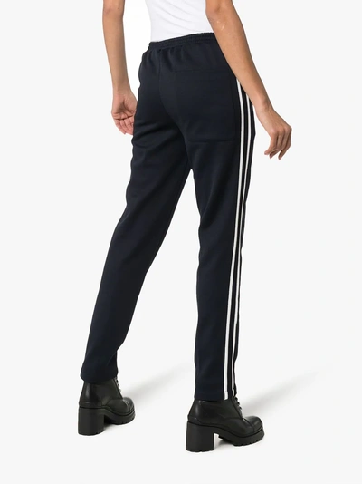 Shop Moncler Logo Detail And Side Stripe Track Pants In Blue
