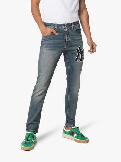 Shop Gucci Tapered Yankees Logo Jeans In Blue