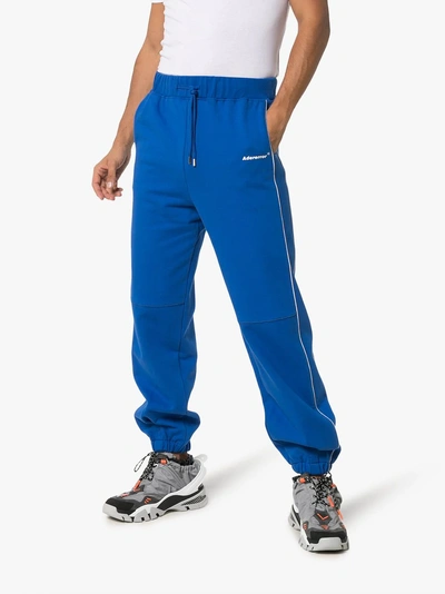 Shop Ader Error Stripe Detail Cotton Sweatpants In Blue