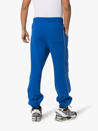 Shop Ader Error Stripe Detail Cotton Sweatpants In Blue