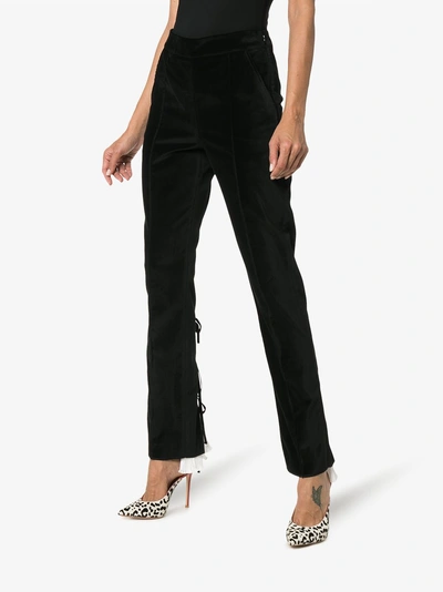 Shop Rosie Assoulin Split Hem Cotton Trousers In Black
