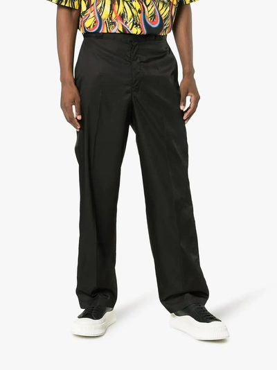 Shop Prada Nylon Gabardine Trousers In Black