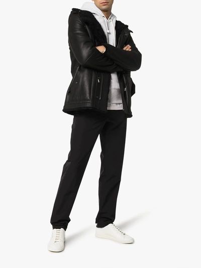 Shop Yves Salomon Reversible Hooded Shearling Jacket In Black