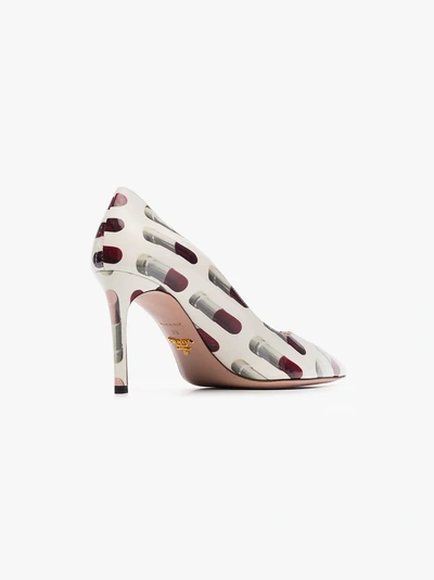 Shop Prada Lipstick Print Pumps In White