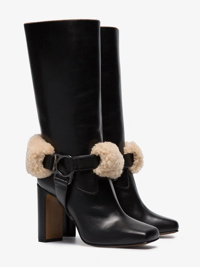 Shop Off-white Riding Xx Leather And Shearling Boots In Black