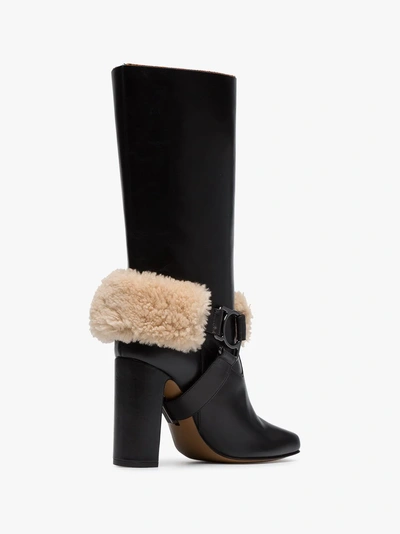 Shop Off-white Riding Xx Leather And Shearling Boots In Black