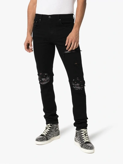 Shop Amiri Bandana Skinny Jeans In Black