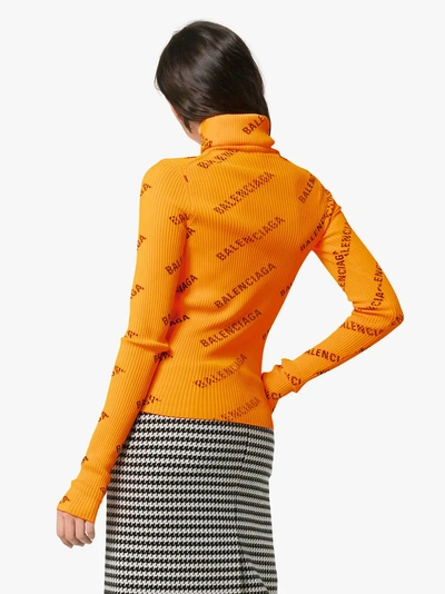 Shop Balenciaga Logo Print Long Sleeved T-shirt In Orange