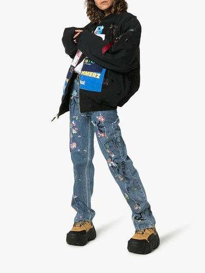 Shop Vetements Jeans Mit Sticker-print In Blue