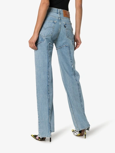 Shop Vetements Frayed Patchwork Detail Jeans In Blue