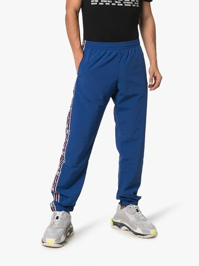 Shop Champion Reverse Weave Logo Stripe Track Pants In Blue