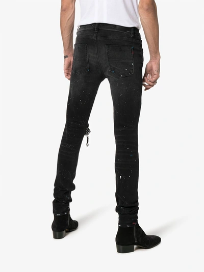 Shop Amiri Skinny-jeans Im Destroyed-look In Black