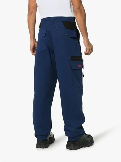 Shop 032c Pleated Cargo Pocket Cotton Trousers In Blue