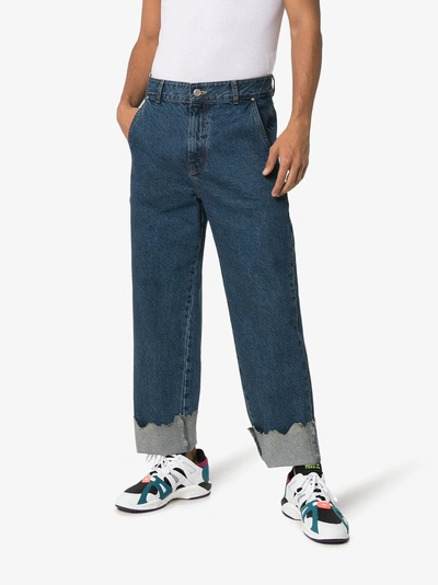 Shop Ader Error Turn Up Torn Hem Cotton Jeans In Blue