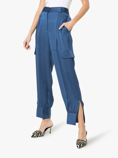 Shop Peter Pilotto Cargo Pocket Slit Hem Trousers In Blue