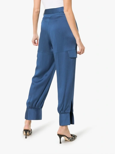 Shop Peter Pilotto Cargo Pocket Slit Hem Trousers In Blue