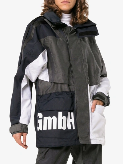 Shop Gmbh X Browns Jeenu Logo Print Drawstring Anorak Jacket In White/navy/grey