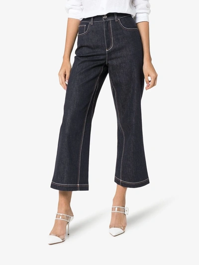 Shop Fendi Cropped Wide Leg Logo Detail Jeans In Blue