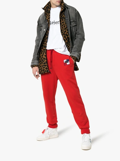 Shop Burberry Embroidered Logo Track Pants In 1002 Red