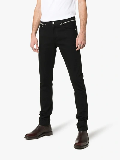 Shop Alexander Mcqueen Schmale Jeans In Black
