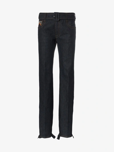 Shop Prada Belted Ruffle Hem Jeans In Blue