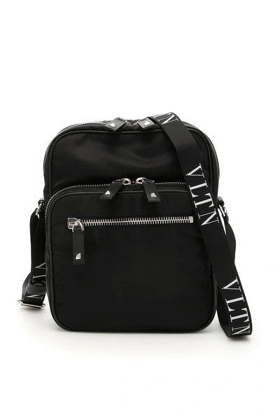 Shop Valentino Vltn Crossbody Bag In Nero Bianco|nero