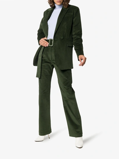 Shop Materiel Matériel Belted Corduroy Flared Trousers In Green