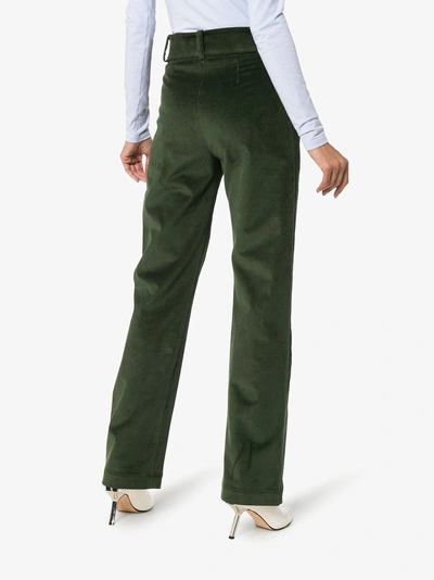 Shop Materiel Matériel Belted Corduroy Flared Trousers In Green