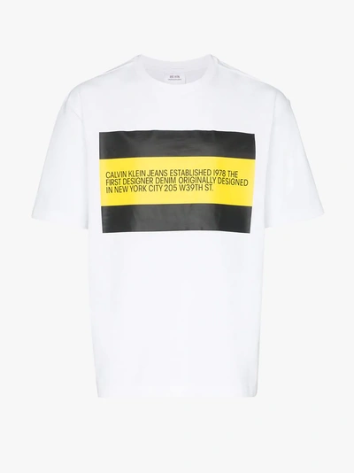 Shop Calvin Klein Jeans Est.1978 Calvin Klein Jeans Est. 1978 Front Flag T-shirt In 001 White/black/yellow Flag