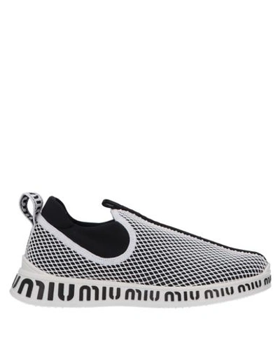 Shop Miu Miu Sneakers In White