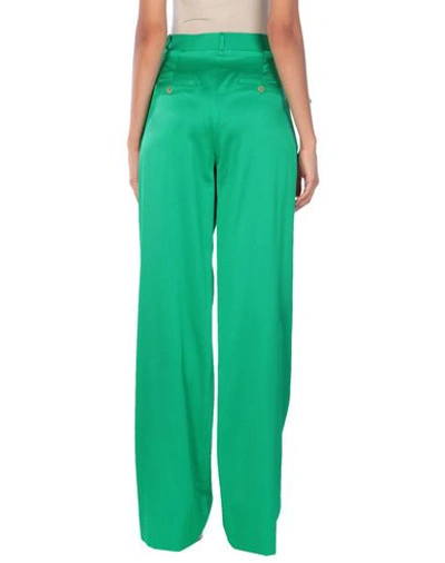 Shop Attico Pants In Green