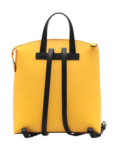 Shop Braccialini Backpack & Fanny Pack In Yellow